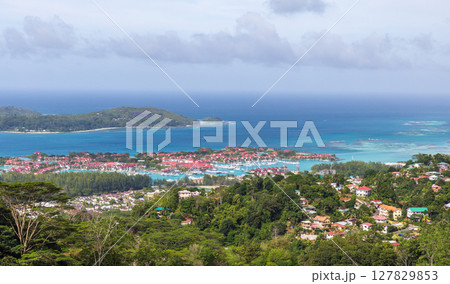 Mahe island, Seychelles. A spectacular aerial view showcasing an islands marina Mahe island, Seychelles. A spectacular aerial view showcasing an islands marina 127829853