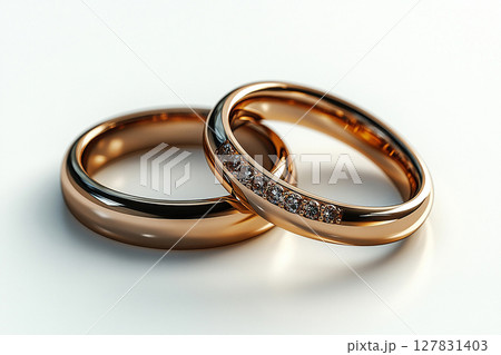 Pair of Wedding Rings on a white background. Pair of Wedding Rings on a white background. 127831403