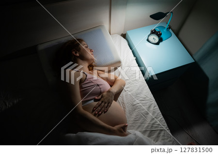 Pregnant woman suffers from insomnia.  127831500