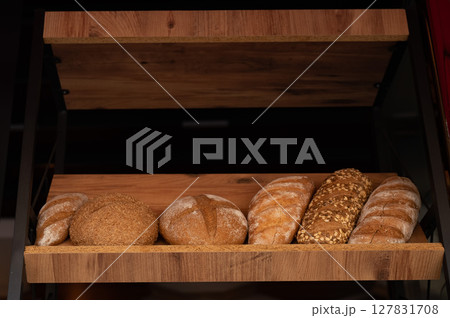 Freshly baked bread on the counter. Freshly baked bread on the counter. 127831708