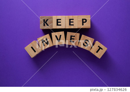 Keep investing in your future, financial advice with wooden cubes Keep investing in your future, financial advice with wooden cubes 127834626