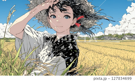 田んぼで農作業をしている女性