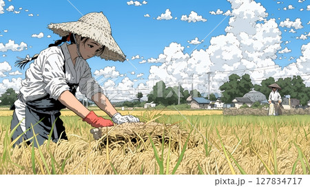 田んぼで農作業をしている女性