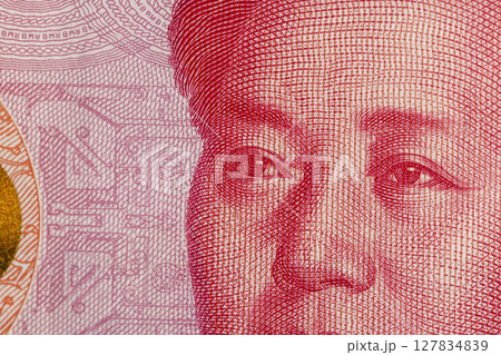 red banknote worth one hundred Chinese yuan , part and details of the 100 yuan red banknote, which is the currency of China 127834839