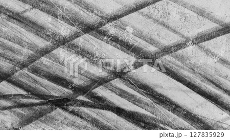 Aerial view car tire marks abstract street road background with black tire marks on race track, Texture and background car automobile and automotive skid tire marks. Aerial view car tire marks abstract street road background with black tire marks on race track, Texture and background car automobile and automotive skid tire marks. 127835929