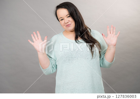 Plus size mature woman in jumper 127836003