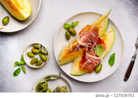 Jamon or prosciutto with melon 127836701