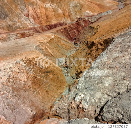 Quarry for the extraction of multi-colored clay Quarry for the extraction of multi-colored clay 127837087
