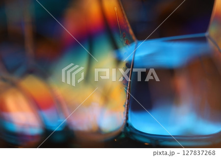 Green liquid surface, green and blue reflections of liquid in macro,, bubbles in macro, connection of bubbles in macro, cell from liquid, dark background, glossy surface 127837268