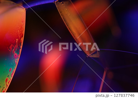 Purple and orange liquid abstraction, phenomenal water forms, dark background 127837746