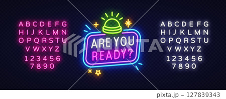Vibrant glowing buzzer and stars decorate the sign ARE YOU READY. in stacked colorful neon lettering. Ideal for countdown intros or interactive scenes 127839343