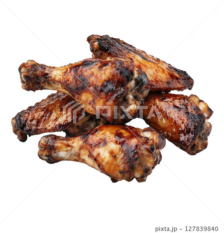 Juicy grilled chicken drumsticks with glossy, caramelized glaze are stacked together, showcasing deliciously charred and savory appearance. Perfect for barbecue feast 127839840