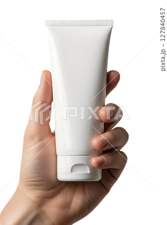 Cosmetic product tube held in hand, clean modern design, blank container for label design 127840457
