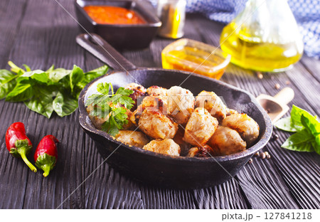 Meat meatballs with spices, sauce and garlic. Top view, copy space. 127841218