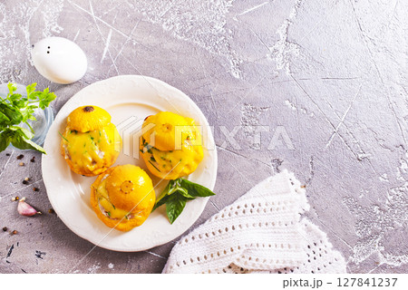 Baked pattypan squash , stuffed with cheese and meat Baked pattypan squash , stuffed with cheese and meat 127841237