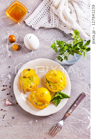 Baked pattypan squash , stuffed with cheese and meat Baked pattypan squash , stuffed with cheese and meat 127841239