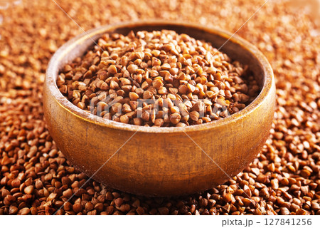 Close up raw buckwheat background. Close up raw buckwheat background. 127841256
