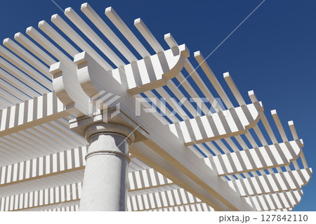 Detail Abstract of A Beautiful Marble and Wood Pergola Patio Cover. 127842110