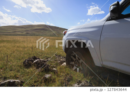 Offroad car got stuck in the mud Offroad car got stuck in the mud 127843644