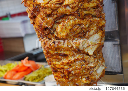 rotating traditional gyros meat close up rotating traditional gyros meat close up 127844286