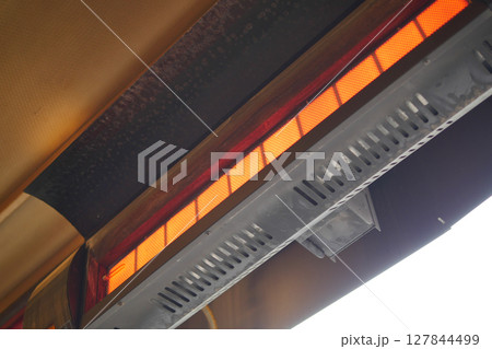 Modern electric infrared heater on celling Modern electric infrared heater on celling 127844499
