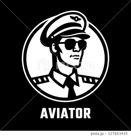 An airplane pilot wearing a cap and sunglasses on a dark background. An airplane pilot wearing a cap and sunglasses on a dark background. 127853435