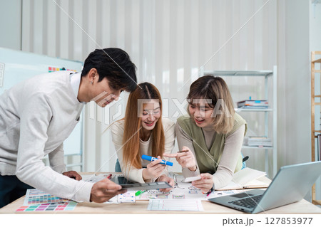 Group of ux developer and ui designer brainstorming about app interface design at modern office. Creative digital development agency 127853977