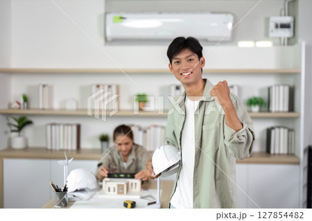 Confident Architect Celebrating Project Success 127854482