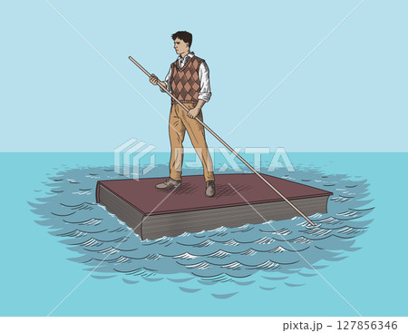 A student floats on a book. 127856346