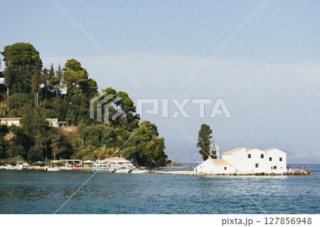 view of Vlacherna monastery island at sunrise, Kanoni, Corfu island Greece 127856948