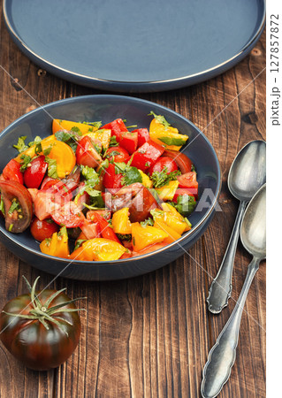 Bowl of fresh tomato salad. Bowl of fresh tomato salad. 127857872
