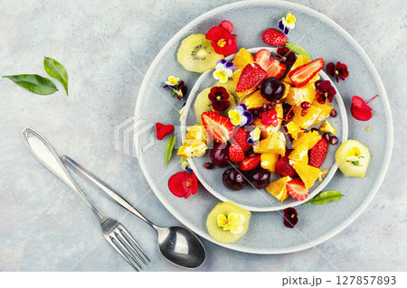 Plate of fresh fruit salad, healthy summer meal. Plate of fresh fruit salad, healthy summer meal. 127857893