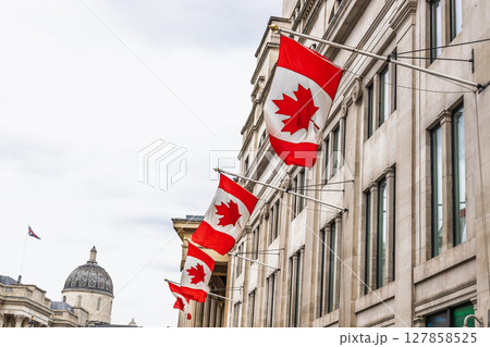 Canadian Flags Lining the Facade of Canada House in London Iconic Westminster District Canadian Flags Lining the Facade of Canada House in London Iconic Westminster District 127858525