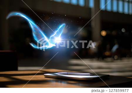 Sunlit Desk with Tablet and Pen, Featuring a Dreamlike Bluebird in a Modern Workspace 127859977