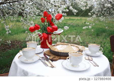 breakfast in the spring garden breakfast in the spring garden 127860400