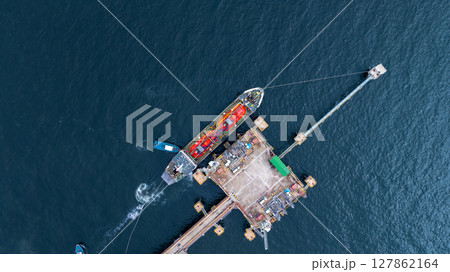 Aerial view LPG gas tanker ship on deep blue sea, Global business freight shipping import export logistic transportation oil and gas product tanker ship, Liquefied Petroleum Gas LPG tanker ship in sea Aerial view LPG gas tanker ship on deep blue sea, Global business freight shipping import export logistic transportation oil and gas product tanker ship, Liquefied Petroleum Gas LPG tanker ship in sea 127862164