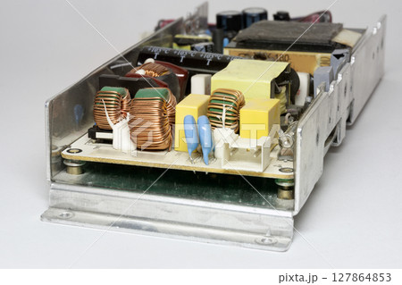 switching mode power supply internal unit of LCD TV. electronic components closeup switching mode power supply internal unit of LCD TV. electronic components closeup 127864853