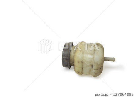 clutch master cylinder reservoir, plastic, pale white, gray cap, on white background, with clipping path 127864885