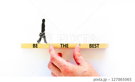 Motivational be the best symbol. Concept words Be the best on beautiful wooden blocks. Beautiful white background. Businesswoman icon. Business motivational be the best concept. Copy space. Motivational be the best symbol. Concept words Be the best on beautiful wooden blocks. Beautiful white background. Businesswoman icon. Business motivational be the best concept. Copy space. 127865065