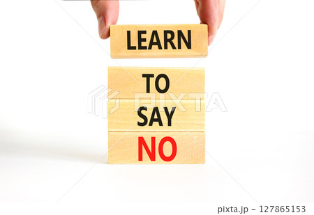 Learn to say no symbol. Concept words phrase Learn to say no on beautiful wooden blocks. Beautiful white paper background. Businessman's hand. Business psychological Learn to say no concept Copy space Learn to say no symbol. Concept words phrase Learn to say no on beautiful wooden blocks. Beautiful white paper background. Businessman's hand. Business psychological Learn to say no concept Copy space 127865153