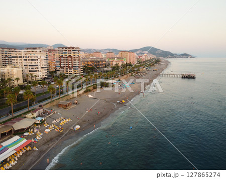 Aerial view of beachfront cityscape at sunset Aerial view of beachfront cityscape at sunset 127865274