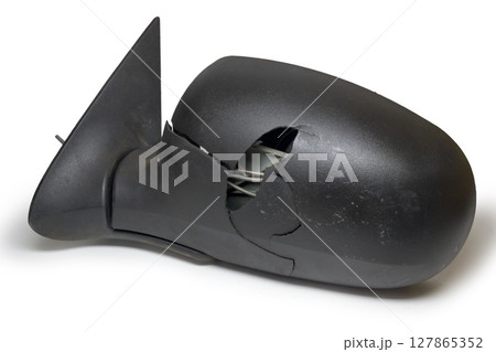 car exterior mirror, with broken plastic housing, showing inner adjusting elements, isolated on white background, with clipping path 127865352