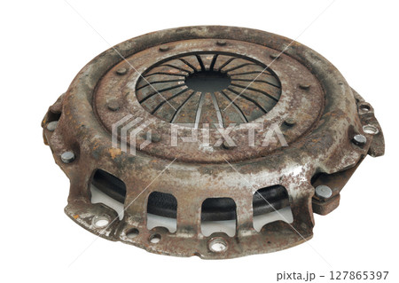 clutch basket diaphragm spring, rust and worn out, dismantled for exchange. isolated on white background clutch basket diaphragm spring, rust and worn out, dismantled for exchange. isolated on white background 127865397