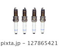spark plugs kit, old. dirty, worn, isolated on white background 127865421