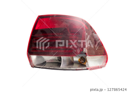 tail light of sedan body car. broken plastic lens. isolated on white background 127865424