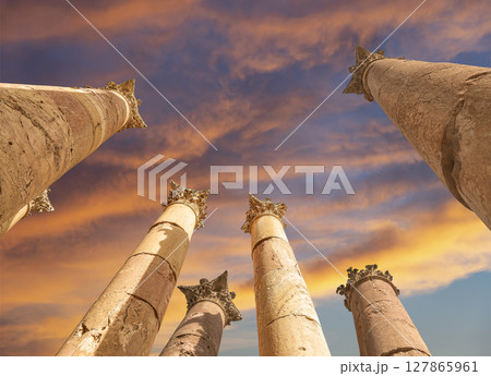 Roman Columns in the Jordanian city of Jerash (Gerasa of Antiquity), capital and largest city of Jerash Governorate, Jordan. Against the background of a beautiful sky with clouds 127865961