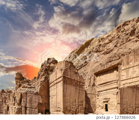 Mountains of Petra (against the background of a beautiful sky with clouds), Jordan, Middle East. Petra has been a UNESCO World Heritage Site since 1985 127866026
