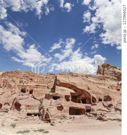 Mountains of Petra (against the background of a beautiful sky with clouds), Jordan, Middle East. Petra has been a UNESCO World Heritage Site since 1985 Mountains of Petra (against the background of a beautiful sky with clouds), Jordan, Middle East. Petra has been a UNESCO World Heritage Site since 1985 127866027
