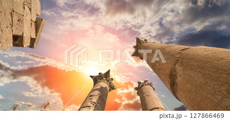 Roman Columns in the Jordanian city of Jerash (Gerasa of Antiquity), capital and largest city of Jerash Governorate, Jordan. Against the background of a beautiful sky with clouds Roman Columns in the Jordanian city of Jerash (Gerasa of Antiquity), capital and largest city of Jerash Governorate, Jordan. Against the background of a beautiful sky with clouds 127866469