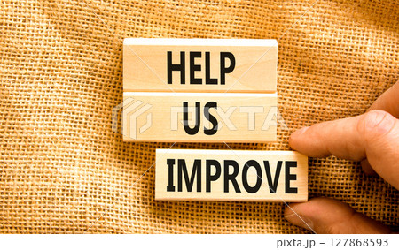 Help us improve symbol. Concept words Help us improve on beautiful wooden blocks. Beautiful canvas background. Businessman hand. Business motivational help us improve concept. Copy space. Help us improve symbol. Concept words Help us improve on beautiful wooden blocks. Beautiful canvas background. Businessman hand. Business motivational help us improve concept. Copy space. 127868593